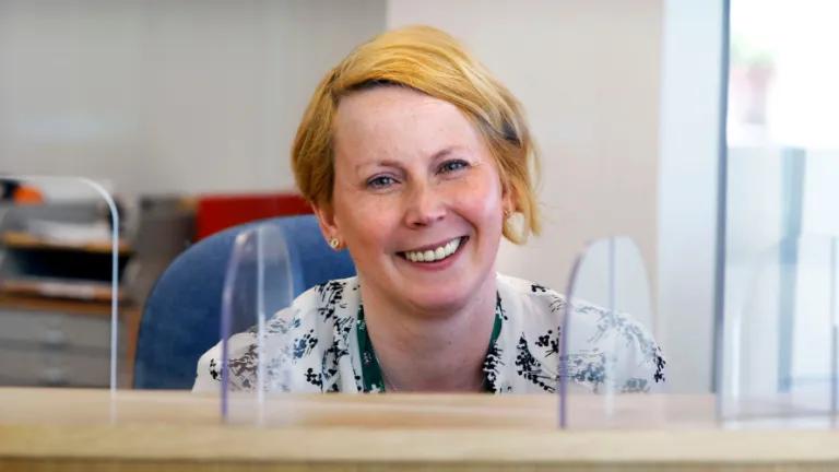 A smiling woman