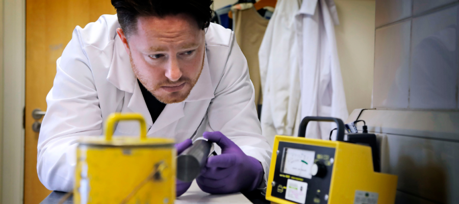 A member of the radiation unit inspects equipment
