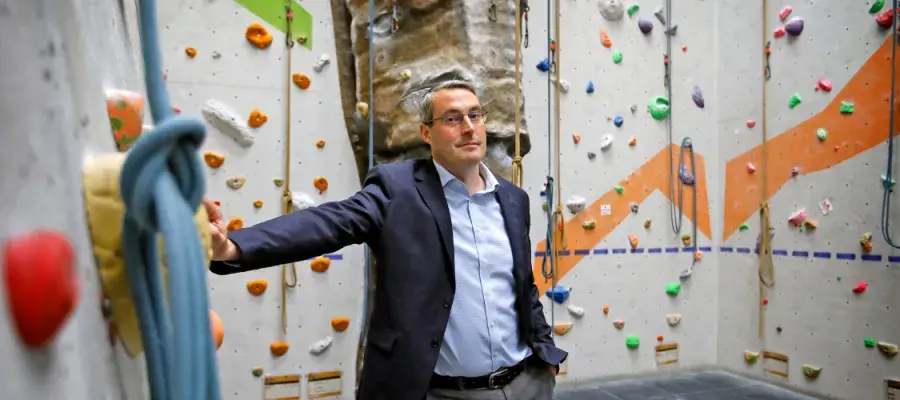 Director Mark Munro in the climbing gym