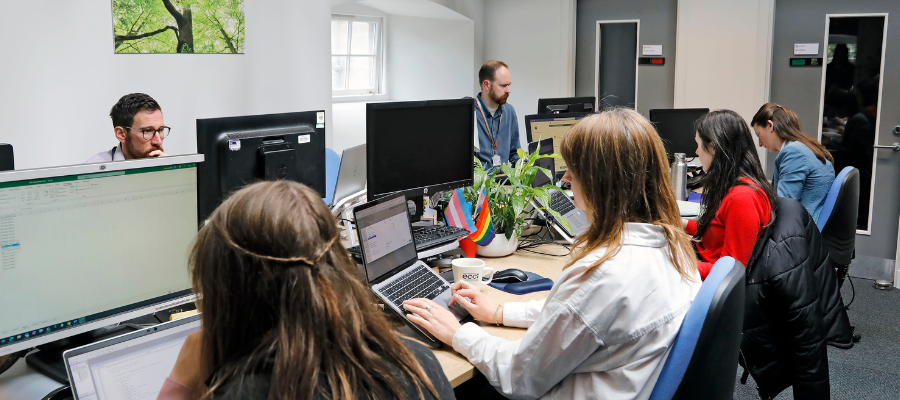 A group of colleagues in a shared working space