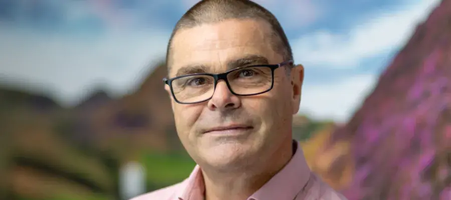 A headshot of James Saville