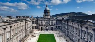 A wide shot of Old College and the quad.