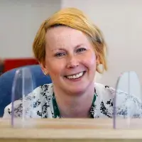 A smiling woman