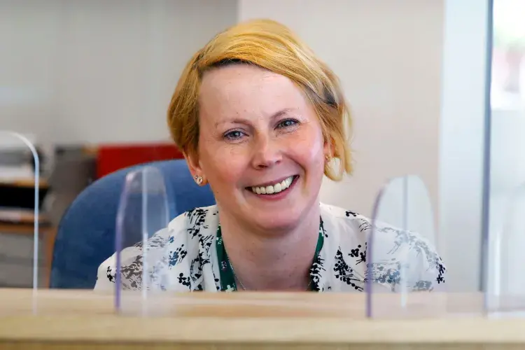 A smiling woman